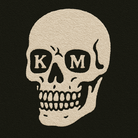 King Made skull logo with K and M in the eyes